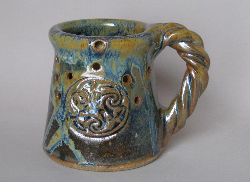 celtic design puzzle mug muddy mountain pottery knotwork
