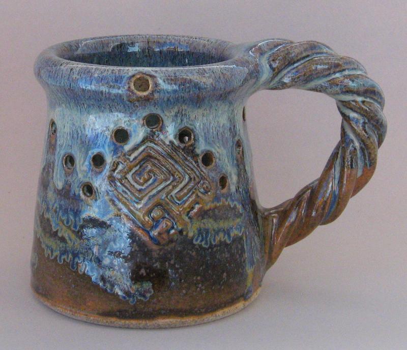 pottery puzzle mug twisted handle muddy mountain